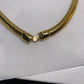 Monet omega checker stretch flex gold black enamel necklace