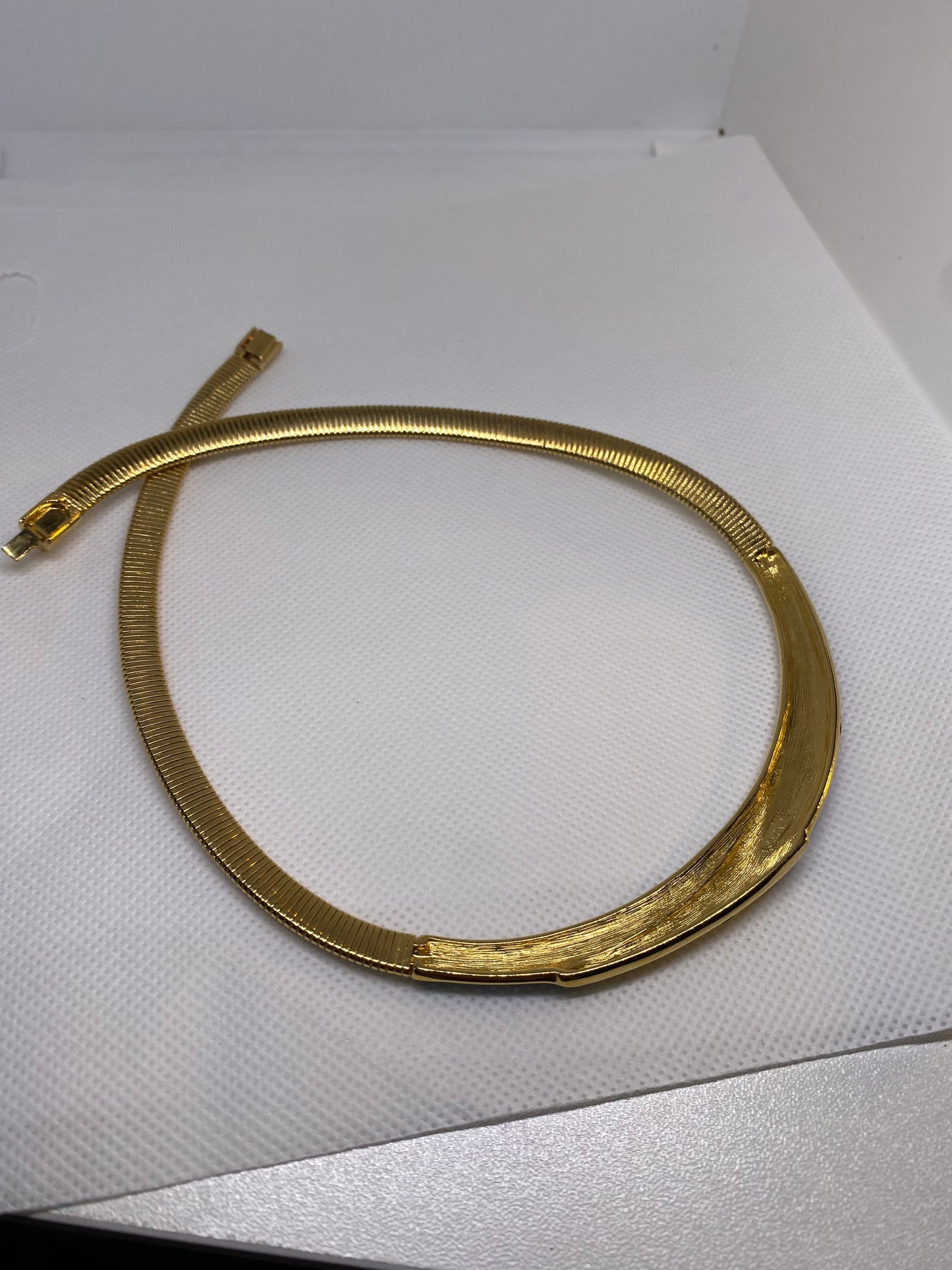 Monet omega checker stretch flex gold black enamel necklace